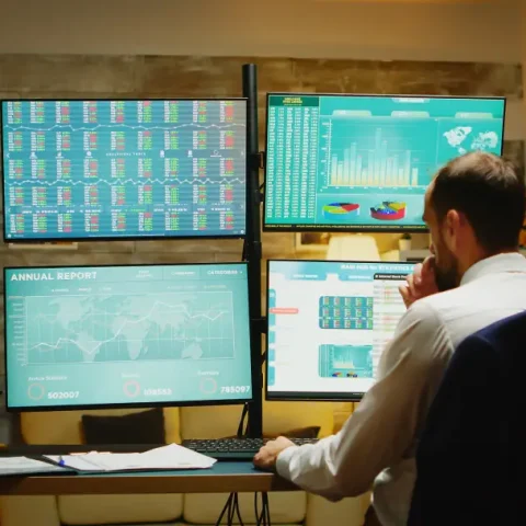 businessman-suit-arriving-home-checking-if-stock-market-is-crashing