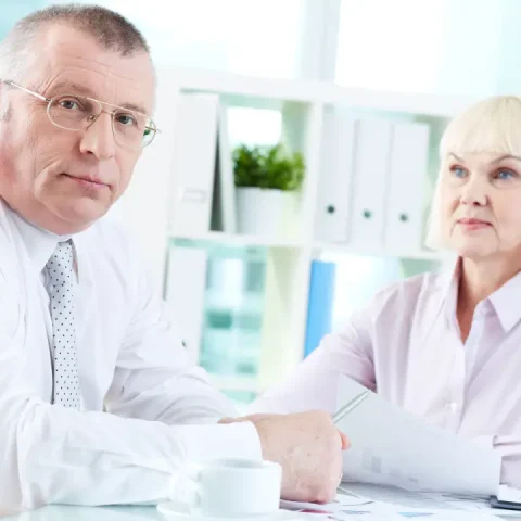 elderly-businessman-his-office