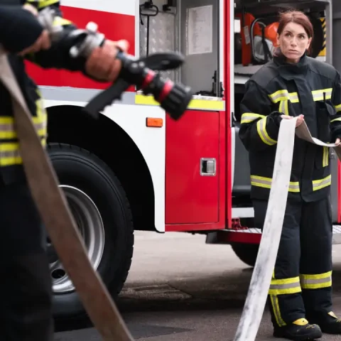 male-female-firefighters-station-working-together