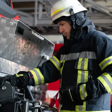male-firefighter-station-equipped-with-suit-safety-helmet