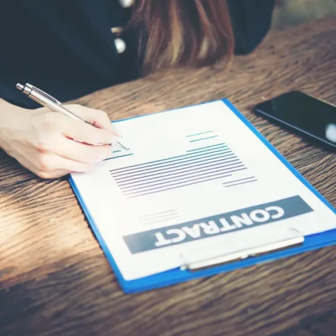 professional-businesswoman-desk-talking-schedule