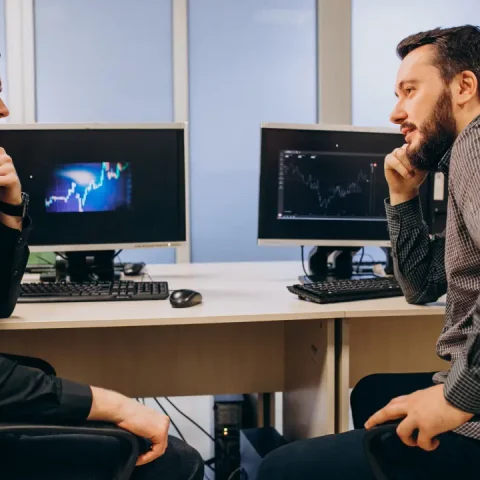 young-male-web-designers-working-computer